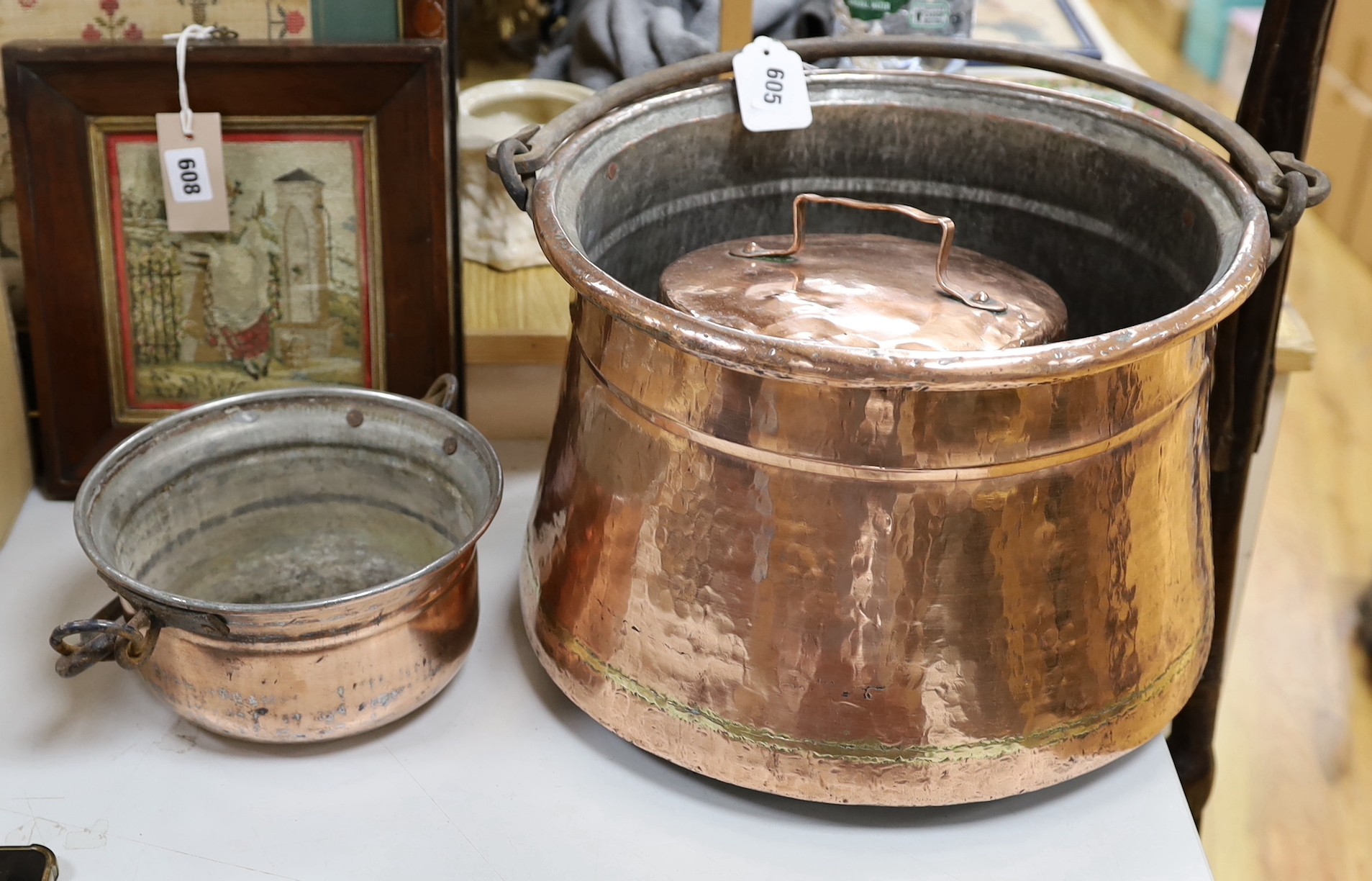 An 18th century French copper cauldron and two others